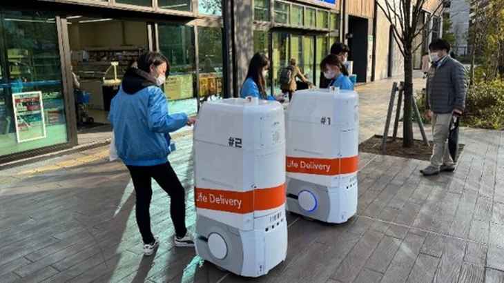 KDDIと野村不動産HD、横浜の大規模マンションでロボット配送の実証実験